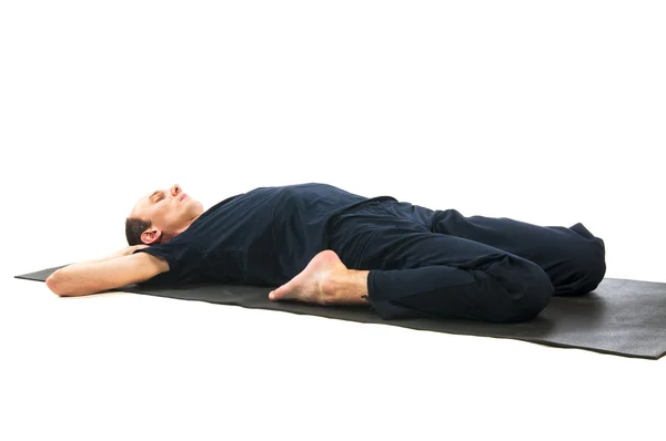 Homem em supta virasana pose — Fotografia de Stock