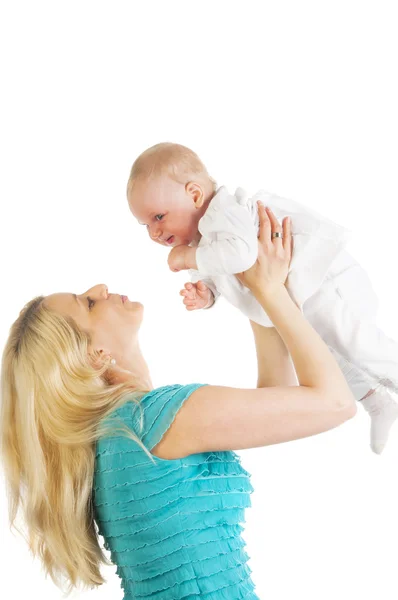 Loving mother holding her cute baby girl — Stock Photo, Image