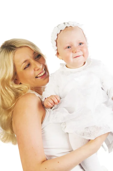 Smiling mother holding her baby girl — Stock Photo, Image