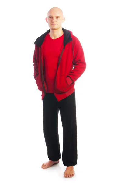 Man in red jacket with zipper holding hands in pockets — Stock Photo, Image