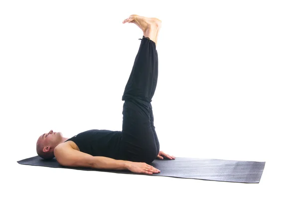 Schöner Mann in urdhva prasarita padasana Pose — Stockfoto