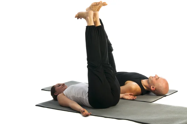 Par i urdhva prasarita padasana pose — Stockfoto