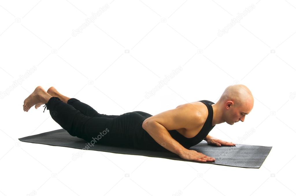 Man in Bhujangasana yoga pose