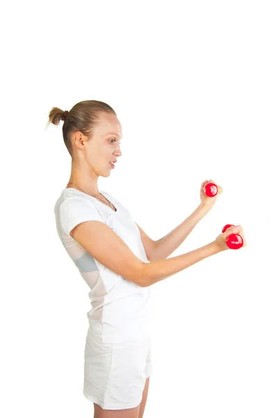 Deportiva haciendo ejercicio con pesas — Foto de Stock