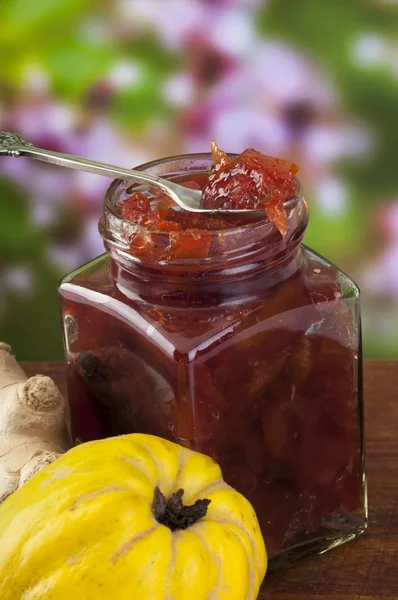 Quince jam in the glass jar with quince fruit — Stock Photo, Image