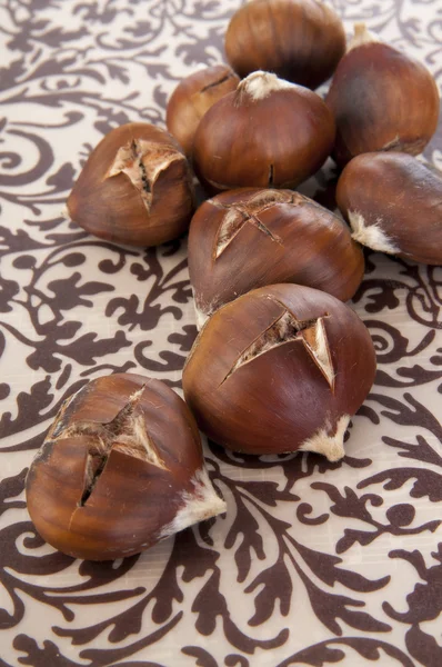 Roasted chestnuts on the table — Stock Photo, Image