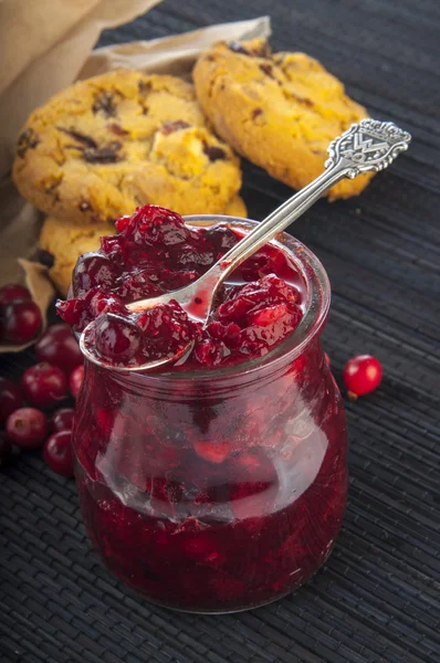Cowberry jam with cookies and berries — Stock Photo, Image