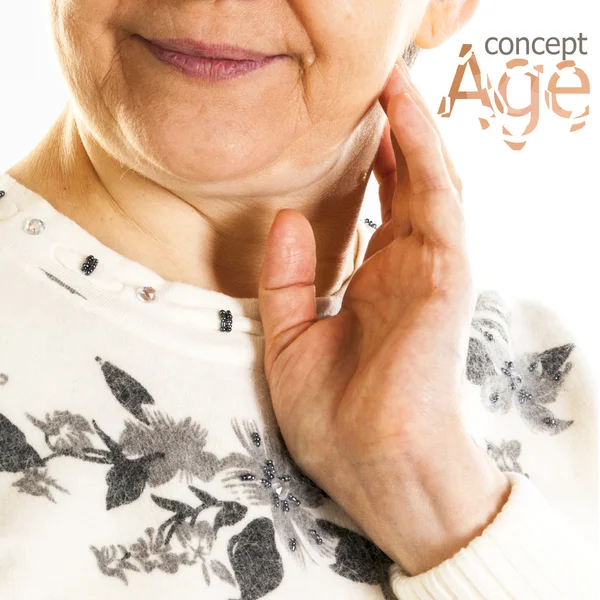 Senior woman touching her face — Stock Photo, Image