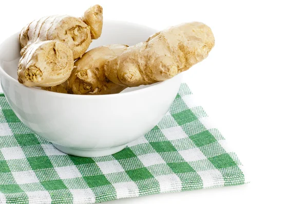 Ginger roots in the white bowl — Stock Photo, Image
