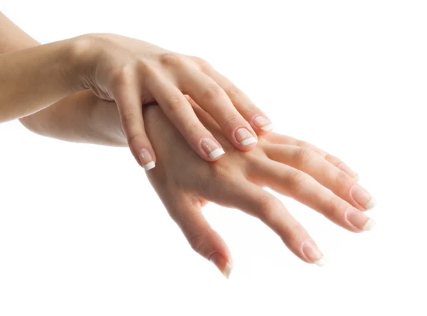 Le mani di donna che applicano la crema per le mani — Foto Stock