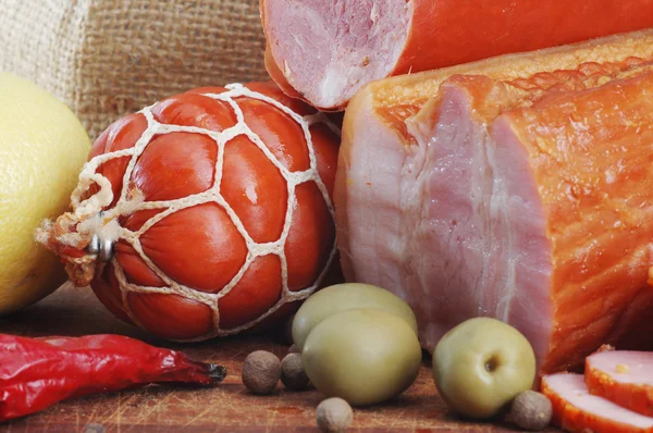 Ham with olives and spices — Stock Photo, Image