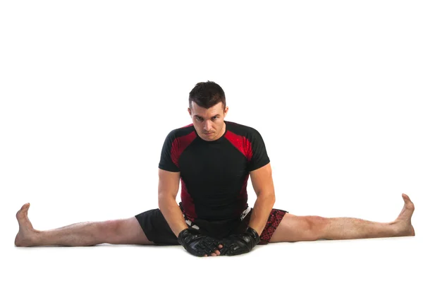 Young boxer doing stretching exercise — Stock Photo, Image