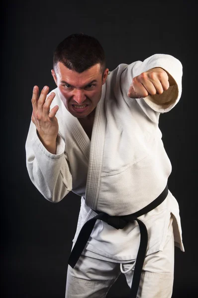 Homem praticando jiu-jitsu brasileiro (BJJ ) — Fotografia de Stock