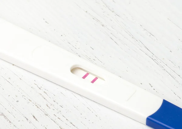 Home Pregnancy Test with positive result — Stock Photo, Image