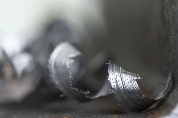 Metal texture and shavings — Stock Photo, Image