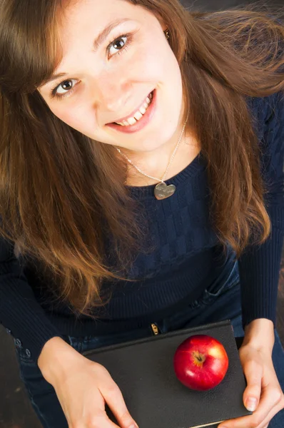 Estudiante chica sosteniendo libros —  Fotos de Stock