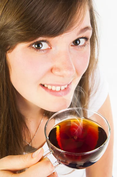 Woman holding cup of black tea — Stock Photo, Image