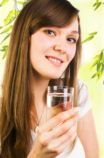 Pretty woman with a glass of water — Stock Photo, Image