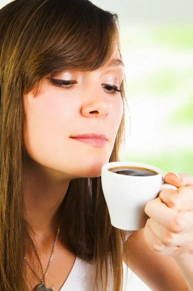 Woman smelling coffee — Stock Photo, Image
