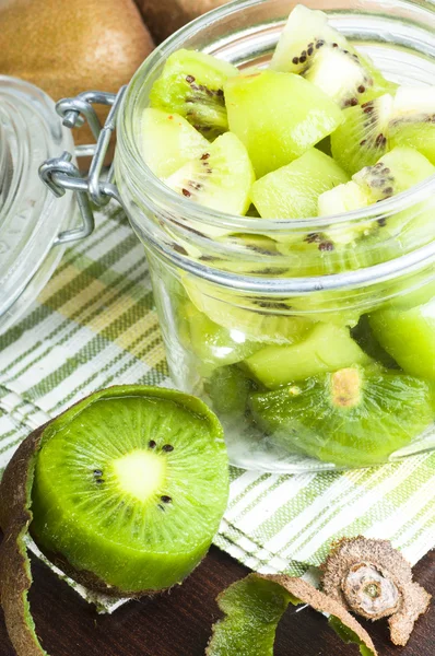 Kiwi fruit in the glass jar — Stock Photo, Image