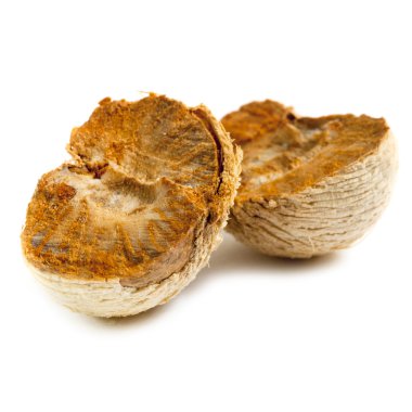 Dried halves of areca nut clipart