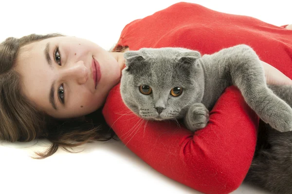Girl lying on the floor with Scottish Fold cat — Stock Photo, Image