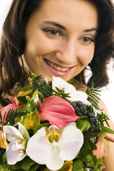 Vrouw met bloemen — Stockfoto