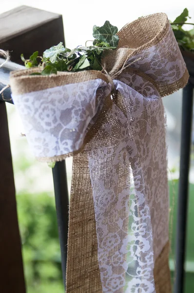 Bow on stair railings — Stock Photo, Image