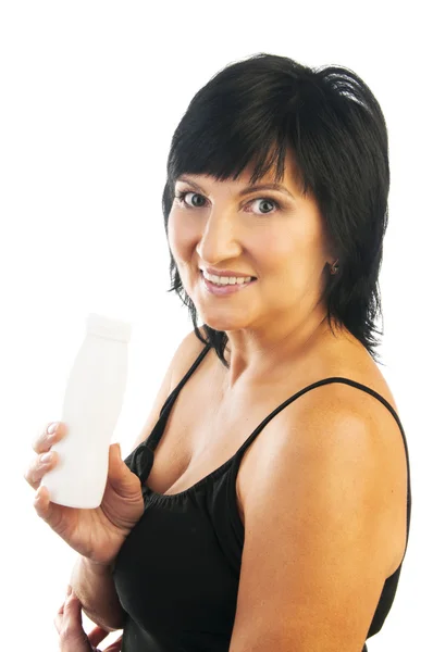 Mature woman with yogurt — Stock Photo, Image