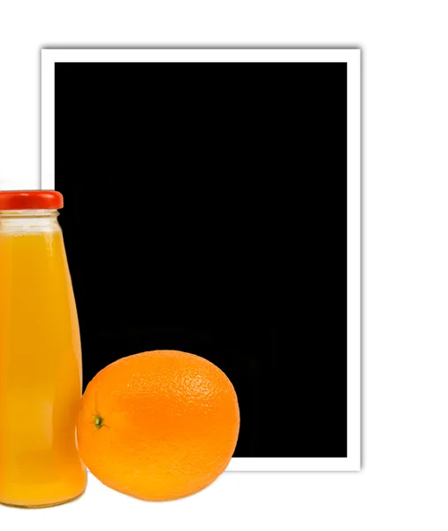 Апельсиновый сок с пустой рамой — стоковое фото