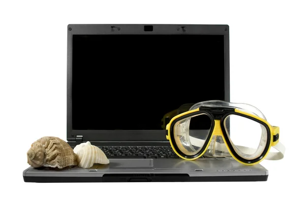 Sea shells and Yellow diving mask on a laptop isolated. Sea trav — Stock Photo, Image