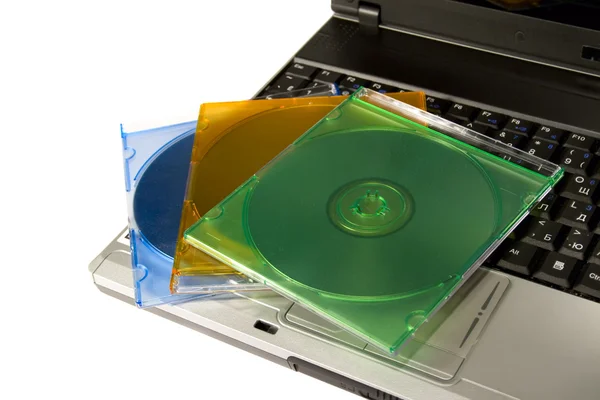 CD colorido em um laptop — Fotografia de Stock