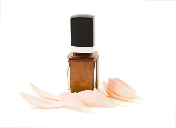 Nail polish with flower petals isolated — Stock Photo, Image
