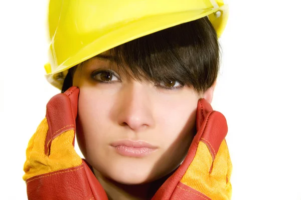 Girl in yellow hard hat and red gloves — Stock Photo, Image