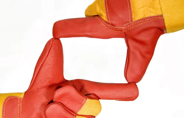 Рамка з червоних захисних рукавичок — стокове фото