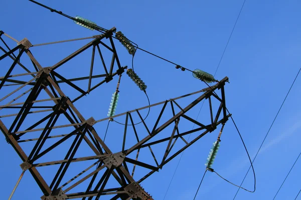 Electric pylon with a blue sky background — Stock Photo, Image