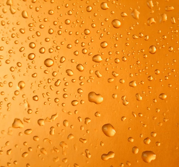 Abstract orange drops of water background — Stock Photo, Image