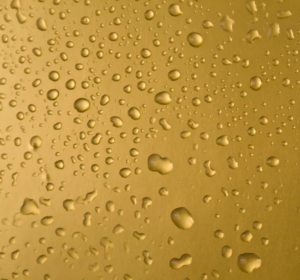 Gotas de oro de agua — Foto de Stock