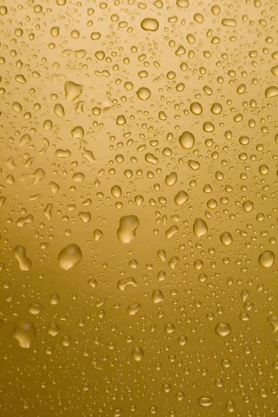 Gold drops of water — Stock Photo, Image