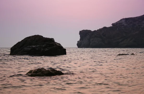 Sunset sea rocky beach — Stock Photo, Image