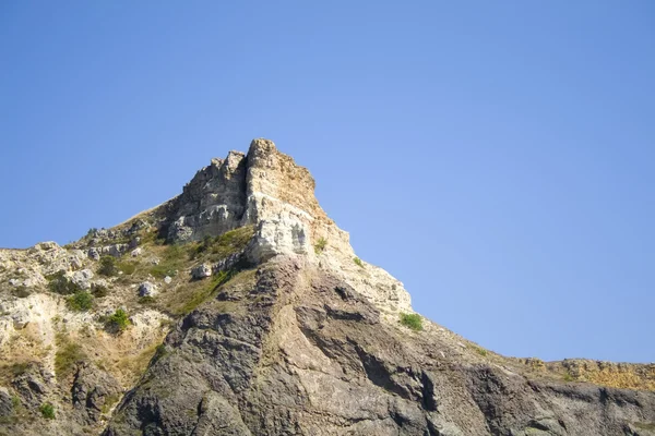 Mountain on a rocky coastline.View from sea. — Stock Photo, Image