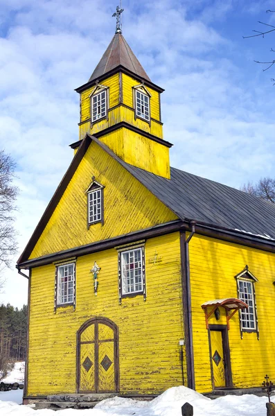 Silenai wooden yellow church facade, Vilnius district, Lithuania Royalty Free Stock Images