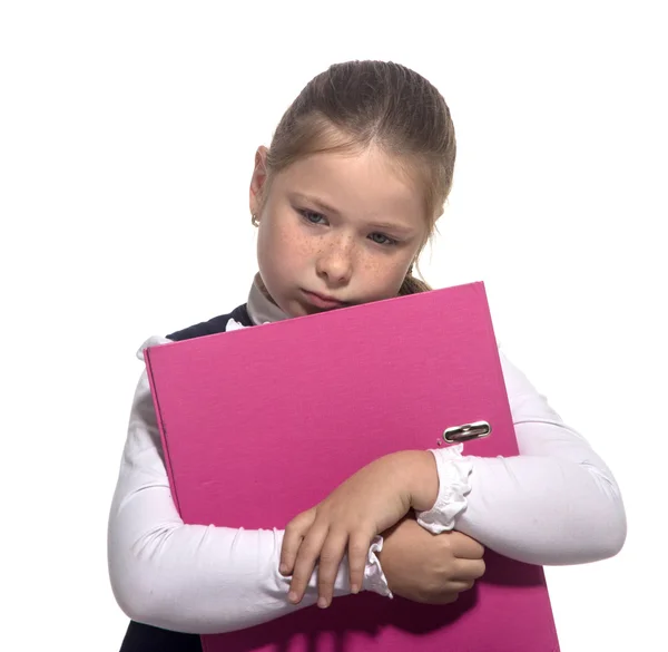 La chica triste de la escuela sostiene un libro —  Fotos de Stock