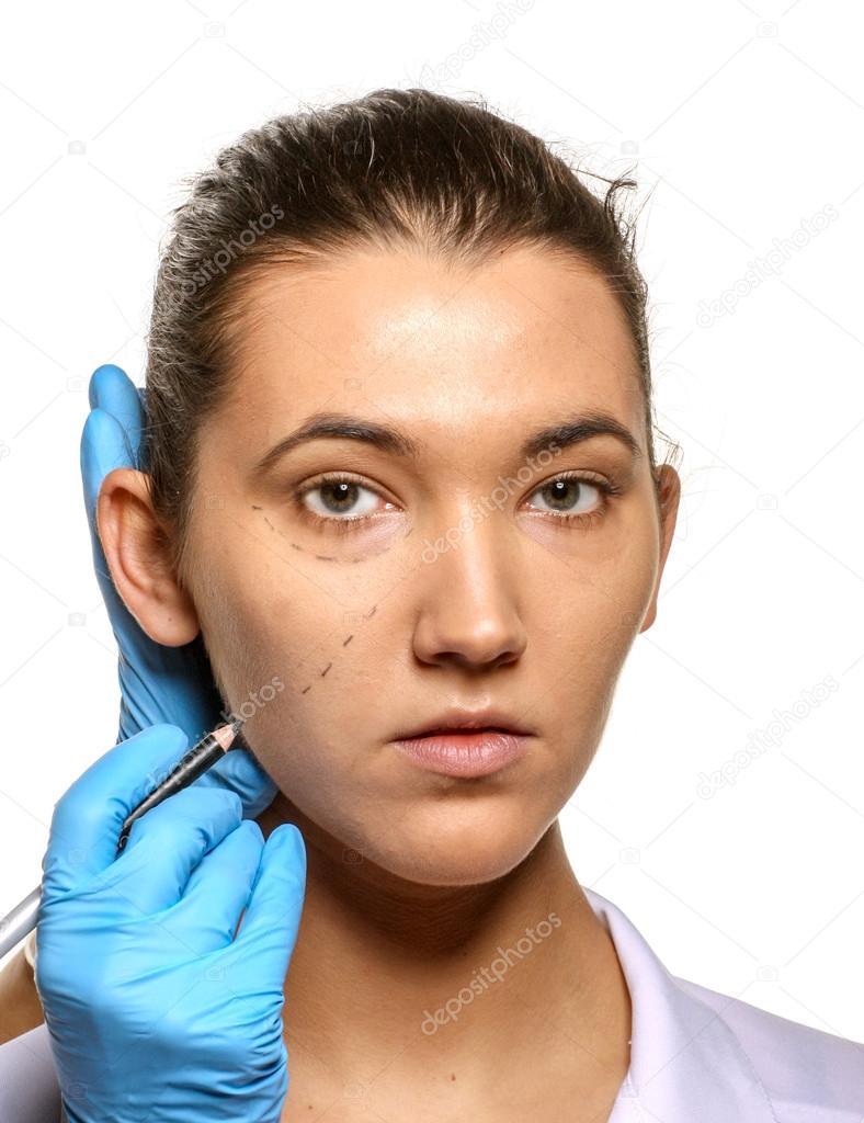 Survey before plastic surgery. Stock Photo by ©gsdonlin 16864591