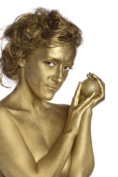 Mujer dorada con manzana dorada — Foto de Stock