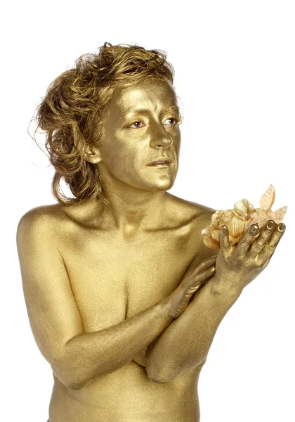 Goldene Frau mit Blume — Stockfoto
