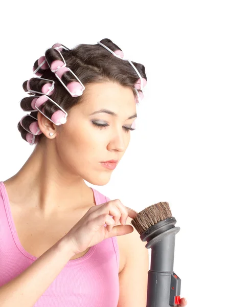 Menina engraçada com encrespadores de cabelo na cabeça — Fotografia de Stock