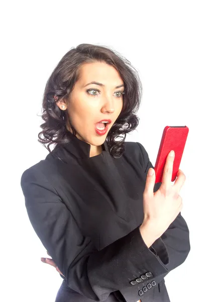 Surprised woman with mobile phone — Stock Photo, Image