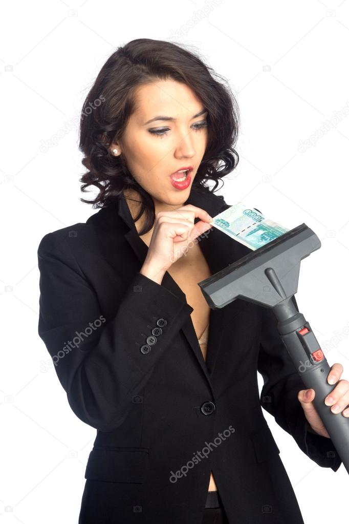 Business woman pull money from vacuum cleaner