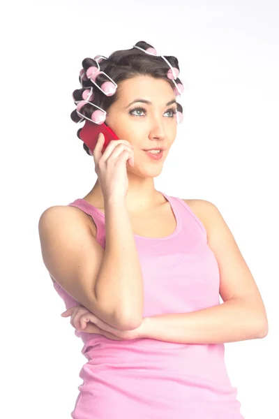 Funny girl with hair curlers on her head — Stock Photo, Image
